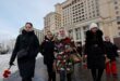 At Putin campaign HQ soldiers wife says bring him home