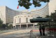 China central bank holds medium term rate but adds liquidity