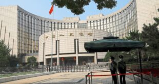 China central bank holds medium term rate but adds liquidity