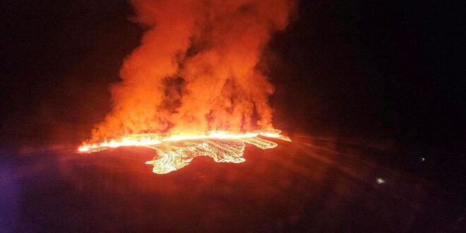 Iceland volcano recedes after black day of town fires