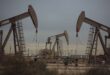 Oil near flat as extreme cold hit US output