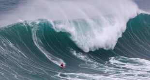 Other Sports Surfing Surfers take on giant waves in Nazare as