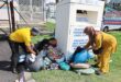 Recycling bins overflowing with uncollected bags of clothing an eyesore