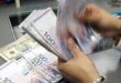 Ringgit ends slightly higher against US dollar