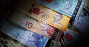 Ringgit ends slightly lower against US dollar