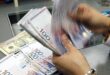 Ringgit opens lower against US as investors await Bank Negara
