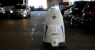 Two robots are patrolling downtown parking garages in the US