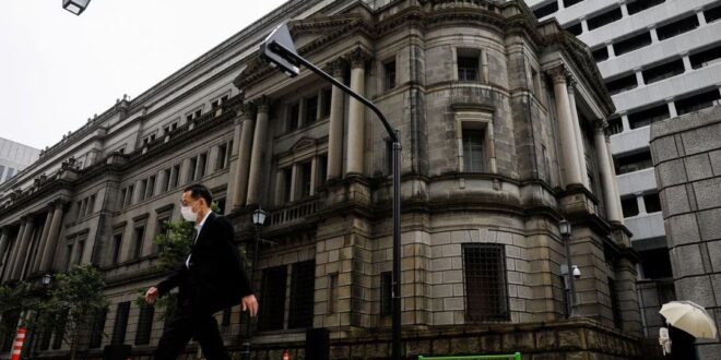 IMF urges BOJ to end bond yield control huge asset