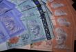 Malaysian ringgit at 26 yr low yuan wobbly after China cuts