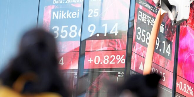 Nikkei pulls back from near record high as tech stocks