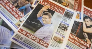 Russian editor defends decision to put Navalny on cover