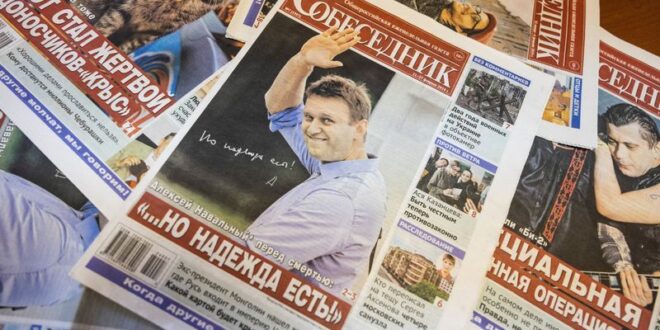 Russian editor defends decision to put Navalny on cover