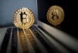 Bitcoin rises to record high