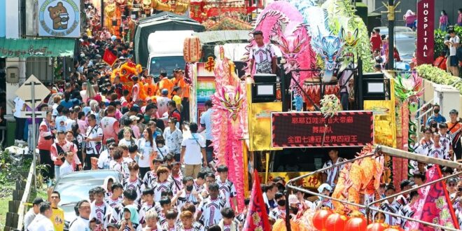 Flags floats and acrobats on show