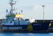 Italy impounds charity ship involved in at sea dispute with