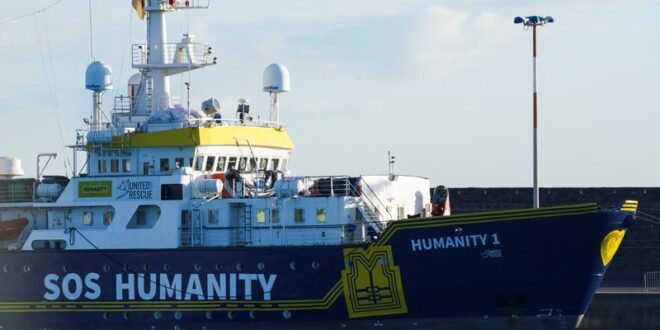 Italy impounds charity ship involved in at sea dispute with