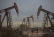 Oil settles lower on weaker US gasoline demand