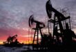 Oil up on US crude stock build Fed rate cut remarks