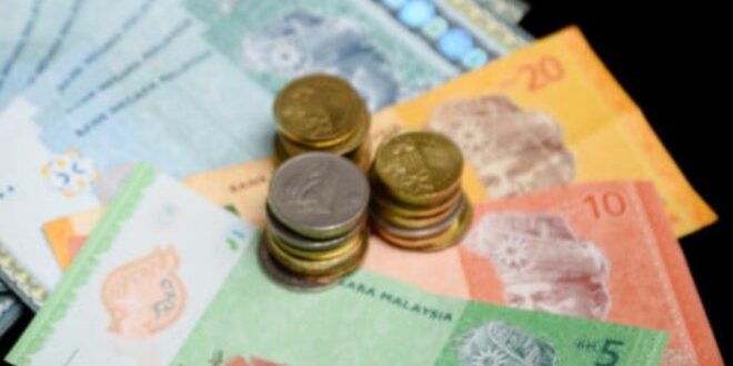 Ringgit closes slightly lower against US dollar sentiment remains favourable