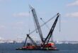 Salvage crews to lift first piece of collapsed Baltimore bridge