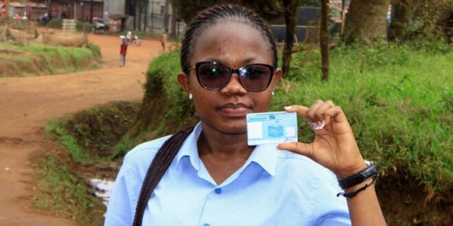 Smudged ID cards missing names blemish Congos 1 billion election