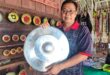 Traditional gong making beats on in Sabah village