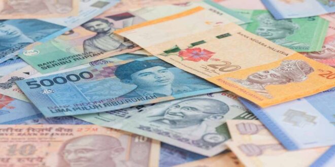 Asian FX subdued after mixed US data equities set for