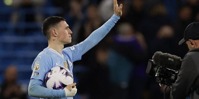 Football Soccer Foden hat trick keeps Man City in thick of title