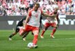 Football Soccer Kane double steers Bayern 2 1 past Frankfurt ahead of