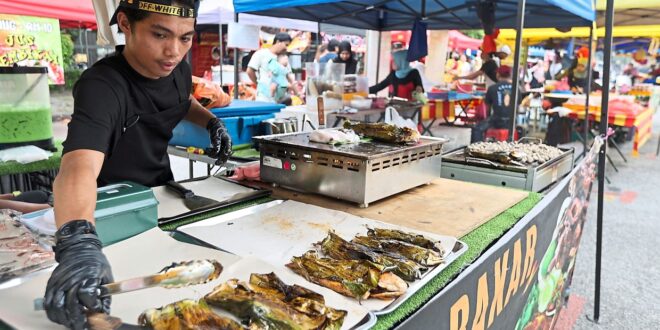 Full time workers set up part time stalls at bazaar