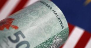 Ringgit ends marginally lower on firmer US dollar index