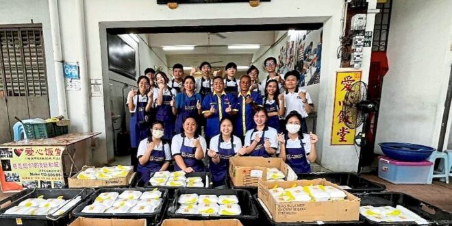 Varsity students deliver meals to needy community