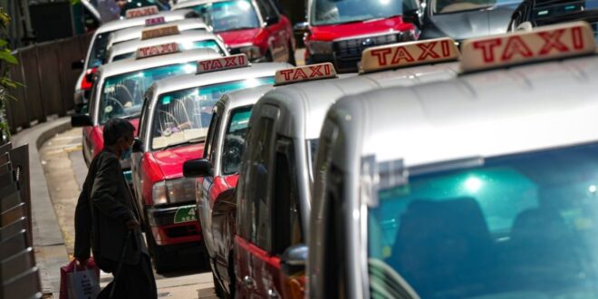 Hong Kongs John Lee warns taxi drivers against targeting Uber