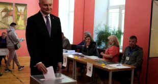 Lithuanians vote in presidential election overshadowed by Russia