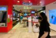 SingTel annual profit more than halves on US23bil impairment charge