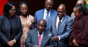 South Africas president approves major health reform law