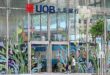 UOB posts small drop in quarterly profit confident of maintaining
