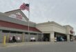 Woman was living inside rooftop grocery store sign with computer