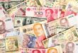 Asian currencies muted on robust dollar rupiah at 4 year low