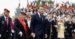 Macron pays tribute to civilian victims of D Day bombings in