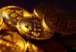 Bitcoin slides to four month lows on liquidation fears ether sinks