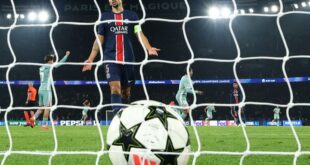 Calhanoglus penalty lifts Inter over Arsenal Atletico stuns PSG in