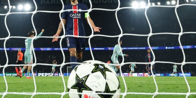 Calhanoglus penalty lifts Inter over Arsenal Atletico stuns PSG in