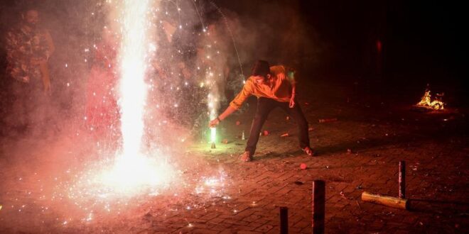 Despite bans firecrackers sizzle across India for Diwali